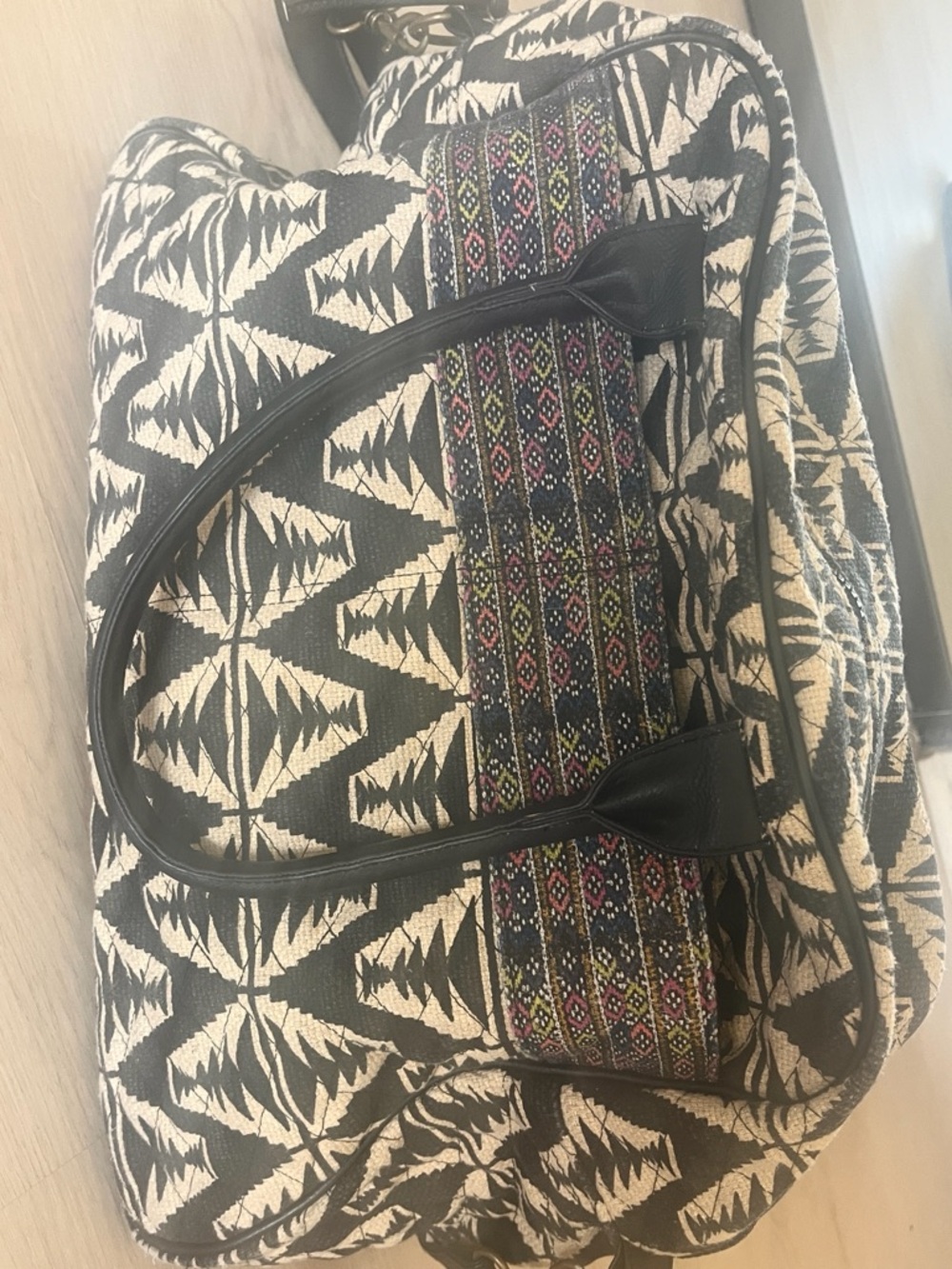 Black and Cream Geometric weekender bag with Multicolor Woven Accent